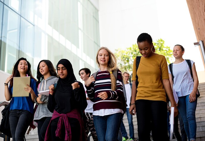 diverse-group-students-walking-school