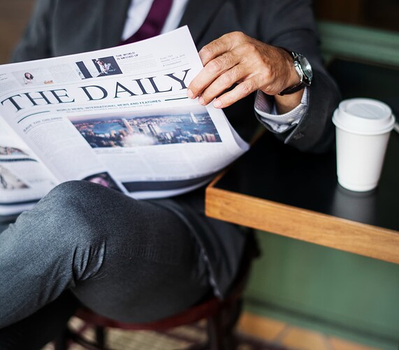 businessman-reading-daily-news